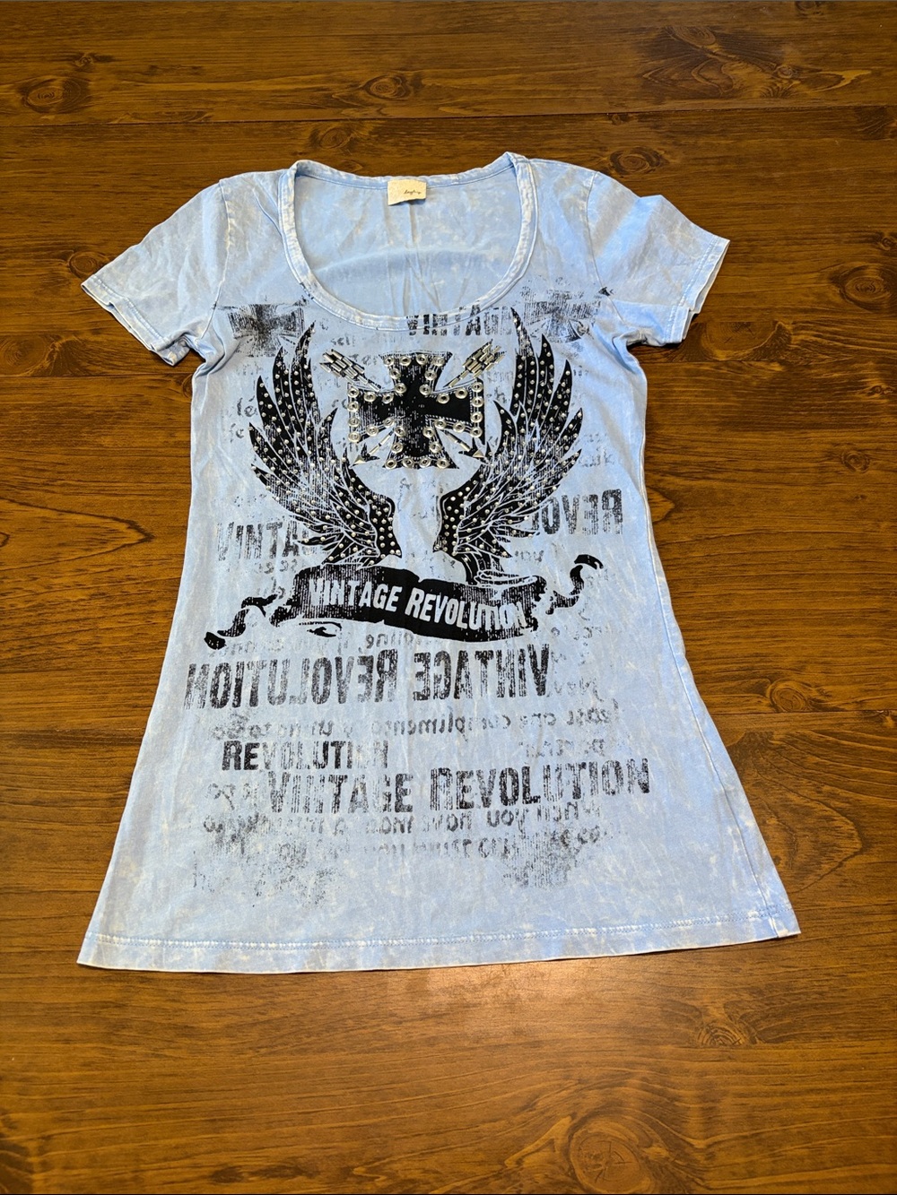 Daytrip Light Blue Scoop Neck Graphic Tee with Black Winged Cross